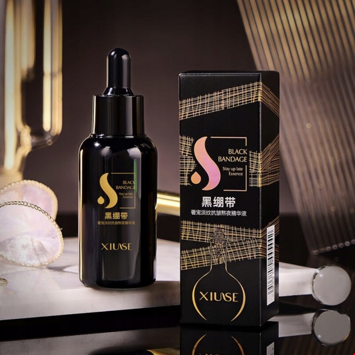 سرم روشن کننده و آبرسان XIUSE طرح Black Bandage